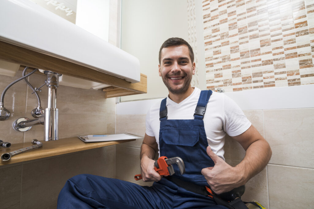 sanitary technician gesturing thumb up
