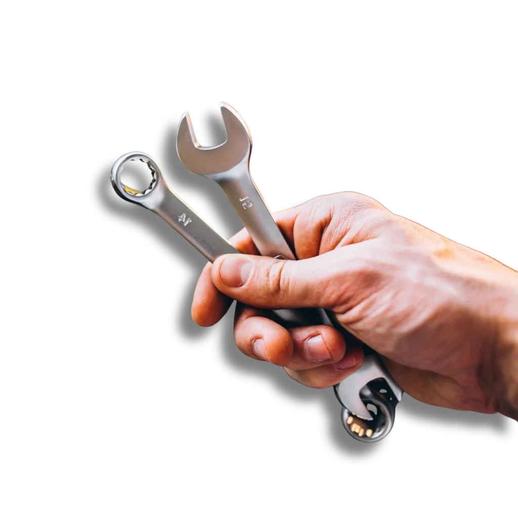 a hand holding a wrench